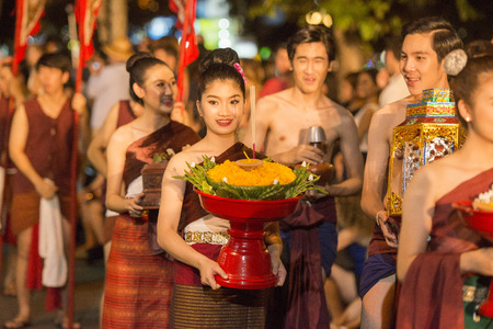 traditional dresst people at the night parade at the Loy Krathong Festival in the city of Chiang Mai in North Thailand in Thailand in southeastasia.のeditorial素材