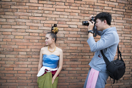 traditional dresst people at the night parade at the Loy Krathong Festival in the city of Chiang Mai in North Thailand in Thailand in southeastasia.のeditorial素材
