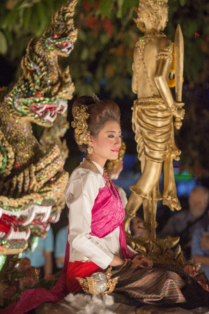 traditional dresst people at the night parade at the Loy Krathong Festival in the city of Chiang Mai in North Thailand in Thailand in southeastasia.のeditorial素材