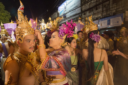 traditional dresst people at the night parade at the Loy Krathong Festival in the city of Chiang Mai in North Thailand in Thailand in southeastasia.のeditorial素材