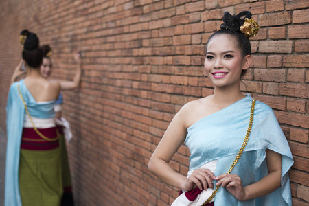 traditional dresst people at the night parade at the Loy Krathong Festival in the city of Chiang Mai in North Thailand in Thailand in southeastasia.のeditorial素材