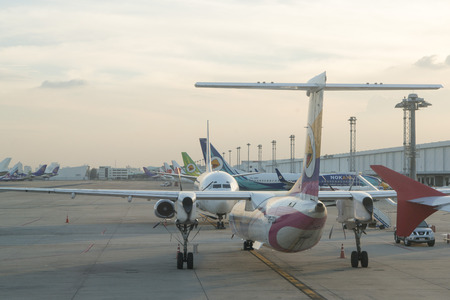 airplanes of Nok air at the Don Muang Airport in Bangkok in Thailand in southeastasia.のeditorial素材