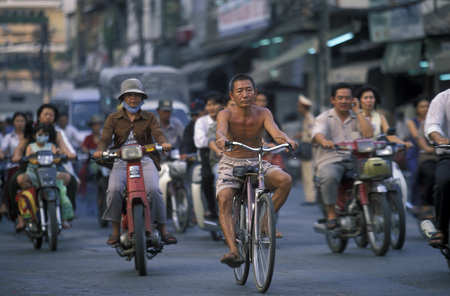 people on the bicycle in the city of ho chi minh city in Vietnamのeditorial素材
