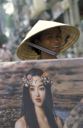 copy Art painter at a market in the city of ho chi minh city in Vietnamのeditorial素材