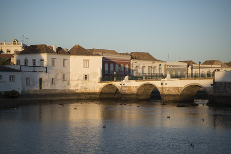 The Bridge Ponte Romana in the old town of Tavira at the east Algarve in the south of Portugal in Europe.のeditorial素材