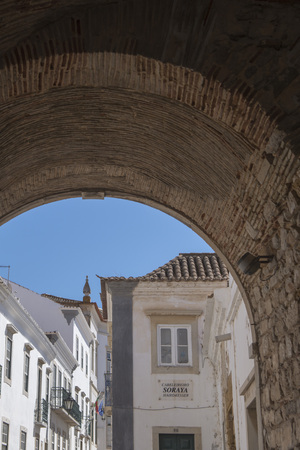 the arco da vila Gatel in the old town of Faro at the east Algarve in the south of Portugal in Europe.のeditorial素材