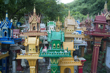 the Spirit Houses on a Pass on the way from Lampang to Mae Tha north of the city of Lampang in North Thailand.の写真素材