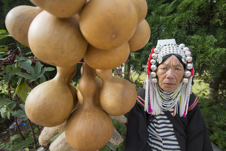 a Akha Hill Tribe women at the Market in the town of Mae Salong north of the city Chiang Rai in North Thailand.のeditorial素材