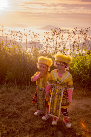 childern of the Hill Tribe of Hmong enjoy at the Cliff of Phu Chi Fa in the Chiang Rai Province in North Thailand.のeditorial素材