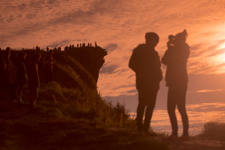 People enjoy at the Cliff of Phu Chi Fa in the Chiang Rai Province in North Thailand.