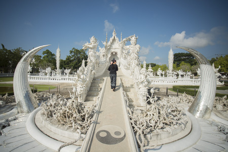 the wat rong khun or white temple near the city Chiang Rai in North Thailand.のeditorial素材