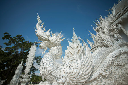 the wat rong khun or white temple near the city Chiang Rai in North Thailand.