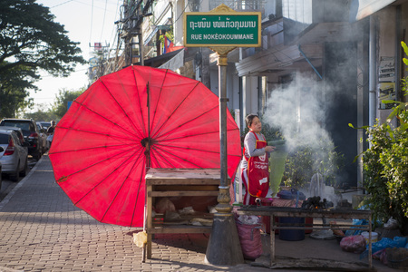 a streetmarket at a road in the city of vientiane in Laos in the southeastasia.のeditorial素材