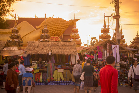 a market at the Buddha near the Pha That Luang Festival in the city of vientiane in Laos in the southeastasia.のeditorial素材