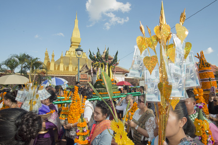 People at a ceremony at the Pha That Luang Festival in the city of vientiane in Laos in the southeastasia.のeditorial素材