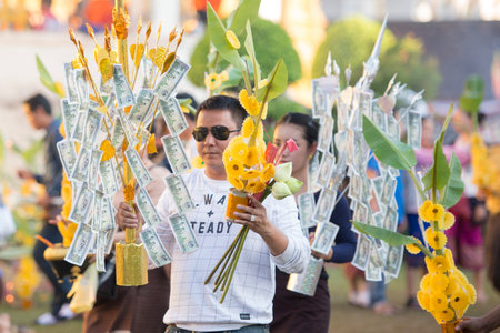 People at a ceremony at the Pha That Luang Festival in the city of vientiane in Laos in the southeastasia.のeditorial素材