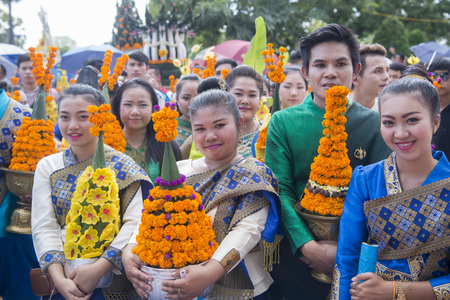 People at a ceremony at the Pha That Luang Festival in the city of vientiane in Laos in the southeastasia.のeditorial素材