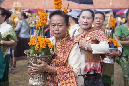 People at a ceremony at the Pha That Luang Festival in the city of vientiane in Laos in the southeastasia.のeditorial素材