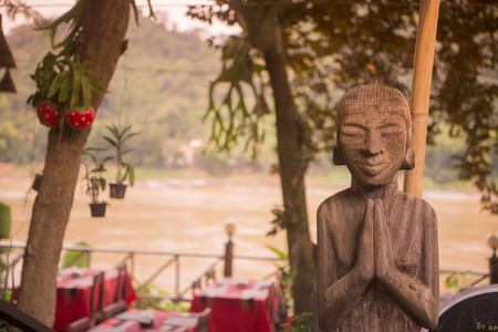 a restaurant at the Mekong River in the town of Luang Prabang in the north of Laos in Southeastasia.のeditorial素材