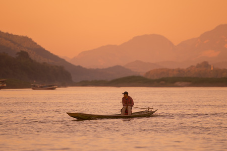 the Landscape at the Mekong River in the town of Luang Prabang in the north of Laos in Southeastasia.のeditorial素材