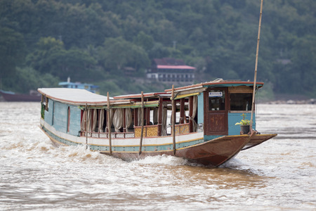 the Landscape at the Mekong River in the town of Luang Prabang in the north of Laos in Southeastasia.のeditorial素材