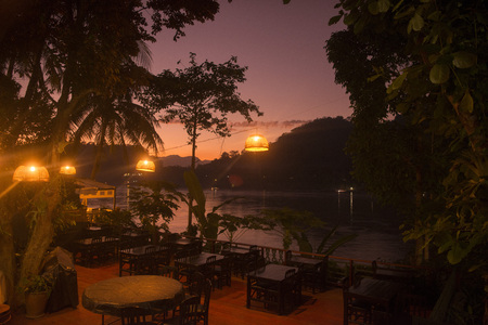 a restaurant at the Mekong River in the town of Luang Prabang in the north of Laos in Southeastasia.のeditorial素材