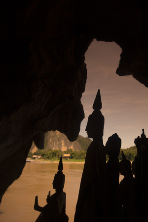 buddha figures at the Buddha Cave of Pak Ou Caves at the Mekong River in the town of Luang Prabang in the north of Laos in Southeastasia.のeditorial素材