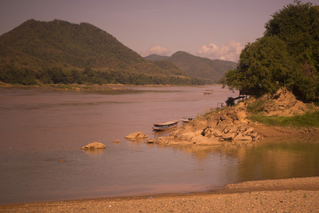 the Landscape at the Mekong River in the town of Luang Prabang in the north of Laos in Southeastasia.のeditorial素材