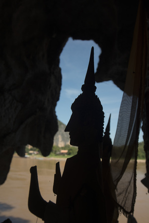 buddha figures at the Buddha Cave of Pak Ou Caves at the Mekong River in the town of Luang Prabang in the north of Laos in Southeastasia.のeditorial素材