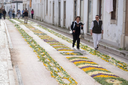 the easter procession Festa das Tochas Flores in the town of Sao Bras de Alportel at the Algarve of...