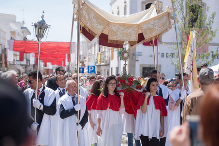 the easter procession Festa das Tochas Flores in the town of Sao Bras de Alportel at the Algarve of...