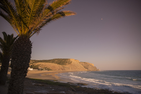 the beach at the village of Luz at the Algarve of Portugal in Europe.の写真素材