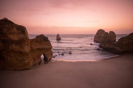 a landscape at the rocks of Ponta da Piedade near Lagos and Luz at the Algarve of Portugal in...