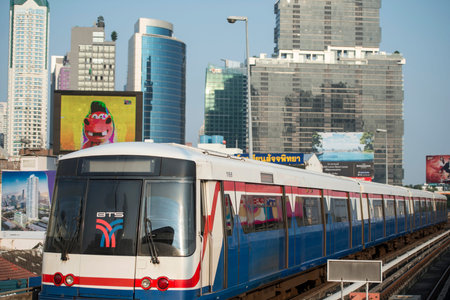 a bts skytrain over the trafic at the sathon road in the city centre at Sathon in the city of...