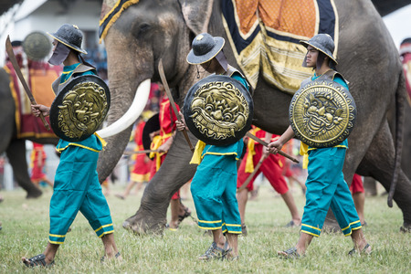 the historical warriors at the Elaphant Show in the Stadium at the traditional Elephant Round Up Festival in the city of Surin in Isan in Thailand. Thailand, Isan, Surin, November, 2017のeditorial素材