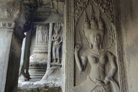 a apsara stone carving at the Angkor Wat Temple in the Temple City of Angkor near the City of Siem Reap in the west of Cambodia.   Cambodia, Siem Reap, April 2014のeditorial素材