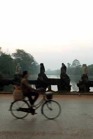 The Bridge of the south gate to the Angkor Tom city in the Temple City of Angkor near the City of Siem Reap in the west of Cambodia.  Cambodia, Siem Reap, April 2014のeditorial素材