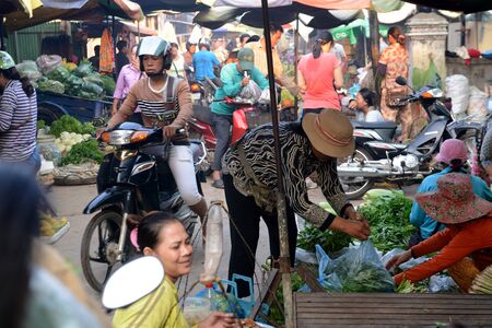 Vegetables at the Food Market in the Morning Market in the City of Siem Reap in Cambodia.  Cambodia, Siem Reap, April 2014のeditorial素材