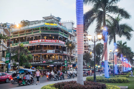 Hotels and Restaurants at the Sisowath Quay at the Tonle Sap River in the city of Phnom Penh of...