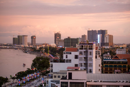 a view of the Tonle Sap River at the Sisowath Quay in the city of Phnom Penh of Cambodia.  Cambodia,...