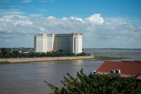 a view to the Hotel Sokha at Songkat Chrouy Changva at the Tonle Sap River in the city of Phnom Penh of Cambodia.  Cambodia, Phnom Penh, November, 2017,のeditorial素材
