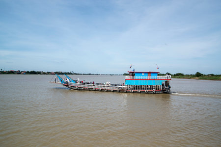 a ferry for cars and Motorbike at the Mekong River in the city of Phnom Penh of Cambodia.  Cambodia, Phnom Penh, November, 2017,のeditorial素材