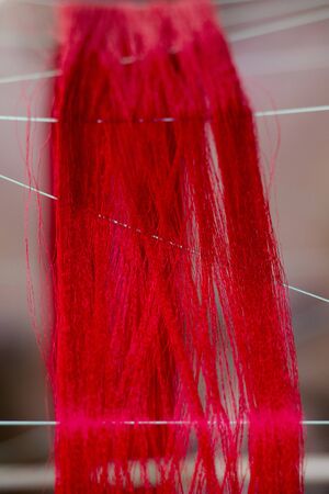 a silk weaving factory at the silk Island or Koh Dach near the city of Phnom Penh of Cambodia.  Cambodia, Phnom Penh, November, 2017,のeditorial素材