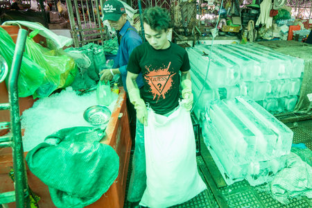 a ice production at the central market or Psar Thmei market in the city of Phnom Penh of Cambodia. ...