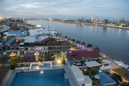 a view of the Tonle Sap River at the Sisowath Quay in the city of Phnom Penh of Cambodia.  Cambodia, Phnom Penh, November, 2017,のeditorial素材