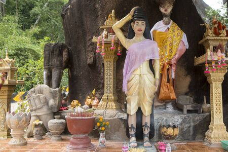 the smal shrine on the mainroad to the Thailand and Cambodian Border Town of Choam north of the Town of Anlong Veng in the province of Oddar Meanchey in Northwaest Cambodia.  Cambodia, Anlong Veng, November, 2017,のeditorial素材