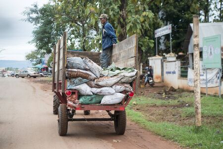 a transport in the city centre of the Town of Anlong Veng in the province of Oddar Meanchey in Northwaest Cambodia.  Cambodia, Anlong Veng, November, 2017,のeditorial素材
