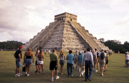 The Maya Ruins with the Kukulkan Pyramide of Chichen Itza in the Province Yucatan in Mexico in...