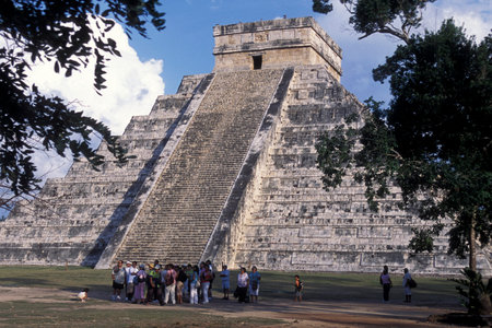 The Maya Ruins with the Kukulkan Pyramide of Chichen Itza in the Province Yucatan in Mexico in...