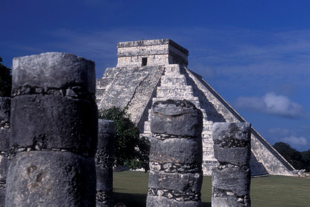 The Maya Ruins with the Kukulkan Pyramide of Chichen Itza in the Province Yucatan in Mexico in...